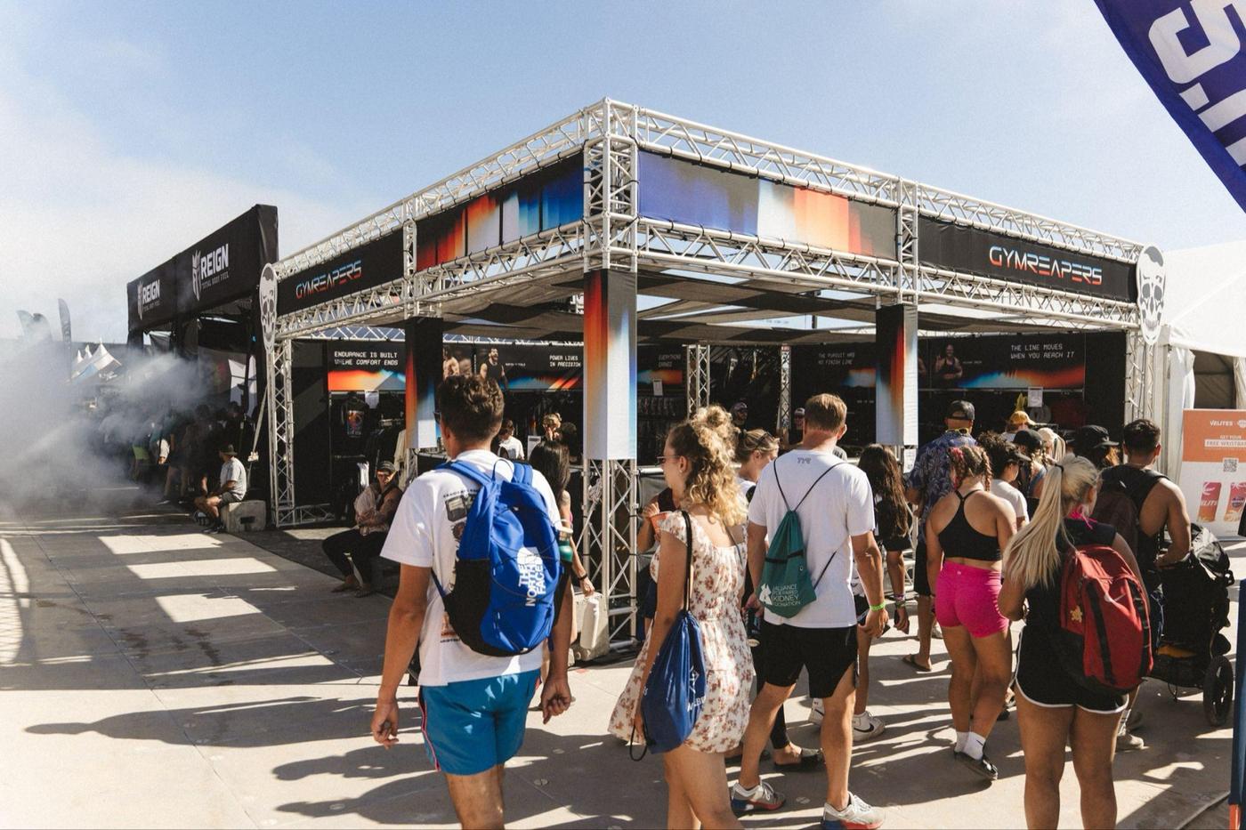 Crowds visiting an exhibitor booth